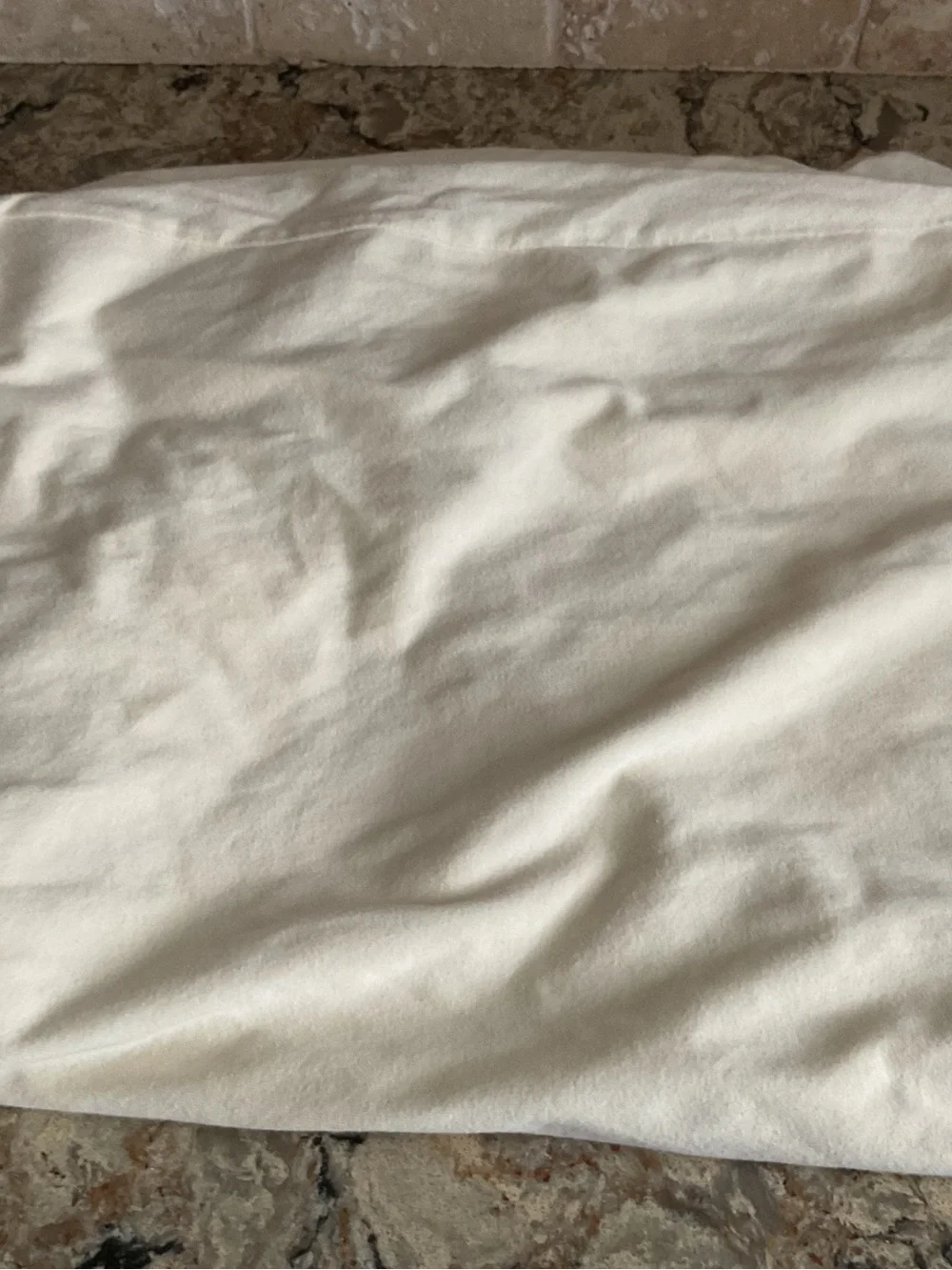 Organic cotton waterproof crib mattress protector by Naturepedic